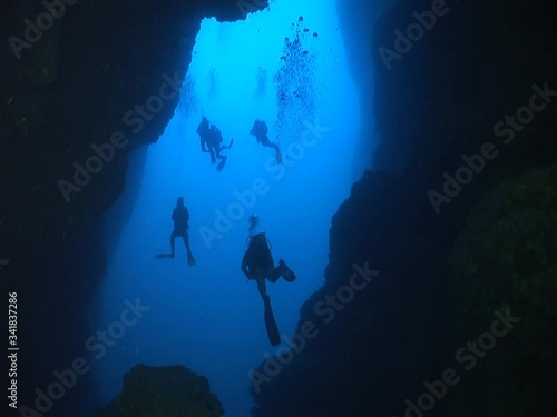 Wallpaper Mural cave diving underwater ocean scenery with blue waters scuba divers to explore Torontodigital.ca