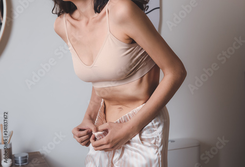 Young woman suffering from ...