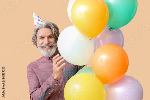 Senior man celebrating Birt...