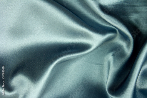 silk fabric, gray satin background, texture and textiles, sewing and manufacturing, material for cutting and sewing clothes