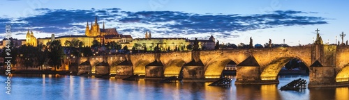 View of Prague Castle and Charles Bridge at sunset. Czechia