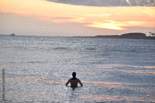 men in sunset