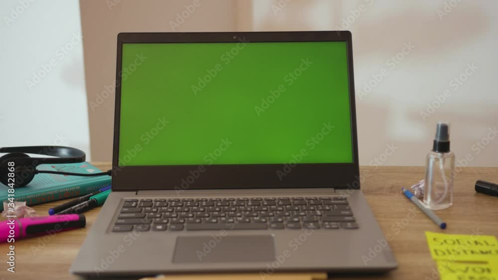 Close up laptop with green screen on working space in home office notebook business internet interior technology mockup design laptop blank workspace display Close up laptop with green screen on working space in home office notebook business internet interior technology mockup design laptop blank workspace display