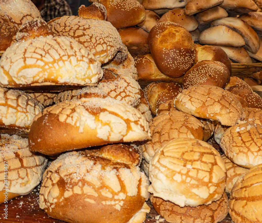 piles of fresh baked bread for sale in an indigenous Mexican market
piles of fresh baked bread for sale in an indigenous Mexican market