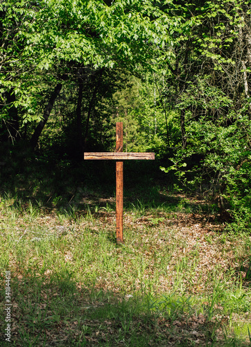 wooden cross in the woods