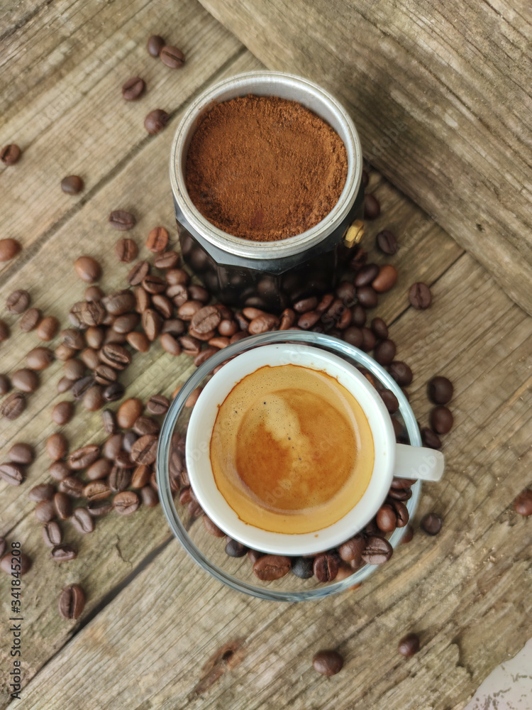 Cup and grain of coffee Cup and grain of coffee