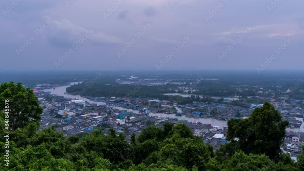 Pak Nam Chumphon town, fisherman village, and river from Khao Matsee scenic viewpoint, day to night; zoom in - Time Lapse