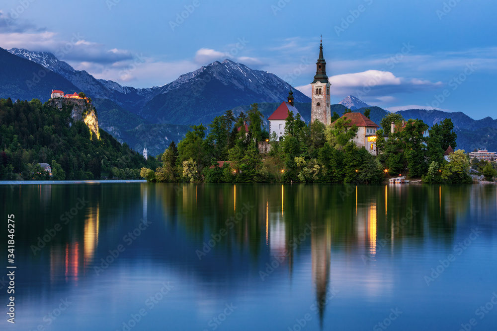 Lake Bled Slovenia. Beautiful mountain lake with small Pilgrimage Church. Most famous Slovenian lake and island Bled with Pilgrimage Church of the Assumption of Maria. Bled, Slovenia, Europe.