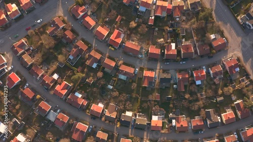 Aerial top down view of residential neighbourhood area showing rows of houses