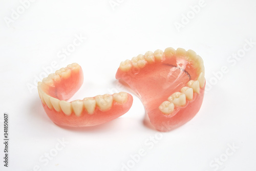 Complete denture on white background