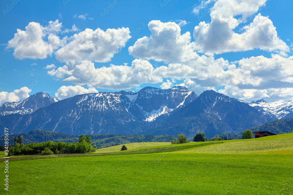 Majestic Alps Mountains covered by snow in the spring season