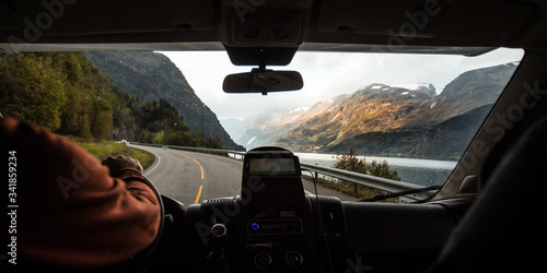 Obraz na plátně Driving through the winding roads Along the Fjords of Norway in an RV Camper Van