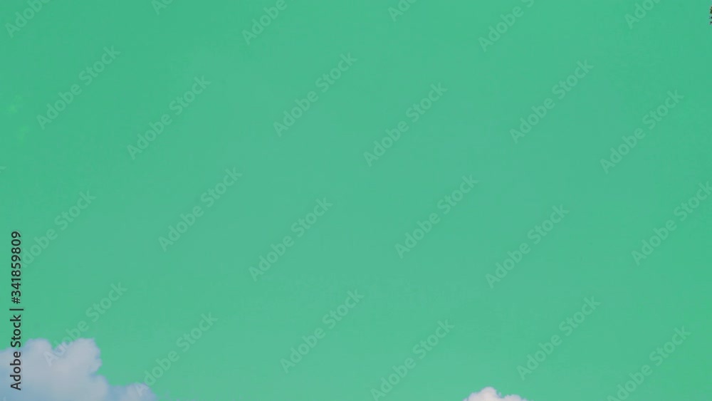 Green screen of moving white clouds with 4K resolution. Can use for ...