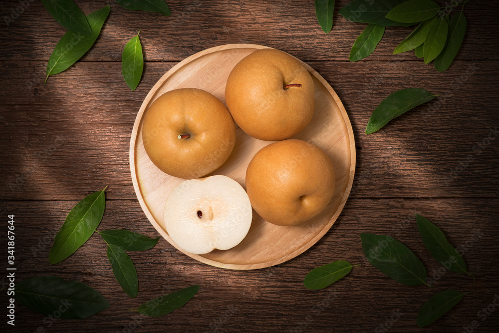 Snow pear or Korean pear on a wooden background, Nashi pear fruits delicious and sweet