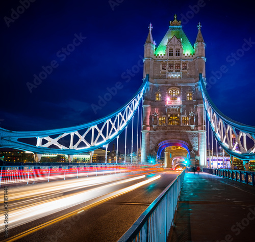 Famous Tower Bridge over themes river London at night London, Aerial view to the illuminated Tower Bridge and skyline of London