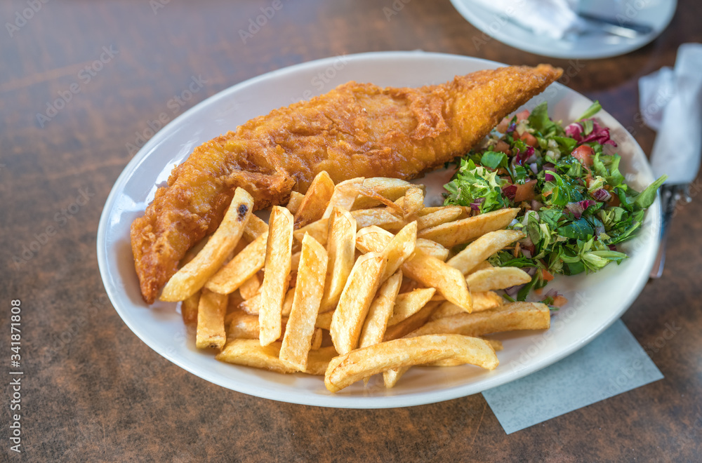Fish and chips,Traditional British fish and chips,Fish and chips Fried fish fillet with french fries. Fish and chips,Traditional British fish and chips,Fish and chips Fried fish fillet with french fries.