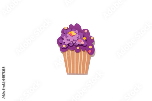 Paper cutting cupcake on isolated background. Handmade art work. Colorful sprinkles for your birthday card design. 