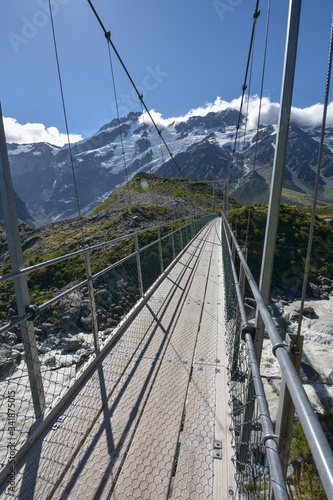 Chain bridge over the river, Hooker valley, New Zealand