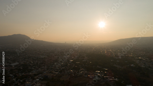 sunset over the city © JorgeAlexis
