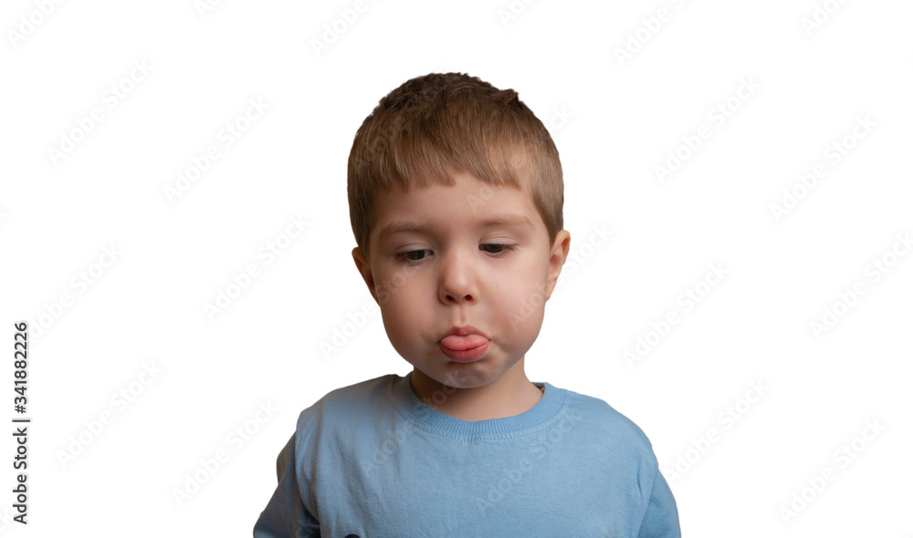 Little Boy Shows Tongue and Puffs Cheeks Little Boy Shows Tongue and Puffs Cheeks