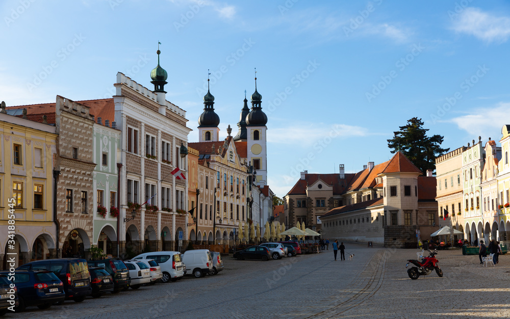 Main square of Telc overlooking church bell towers