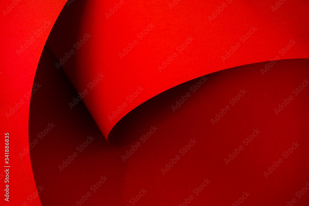 Designer red paper. Copy space on monochrome paper