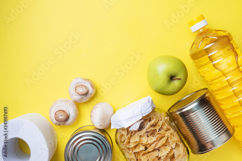 Wallpaper Mural Food donation on a yellow background. Copy of the space. Top view. Torontodigital.ca