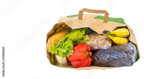 supply vital food items during the quarantine coronavirus Covid-19. food donations in a paper bag on a white background
