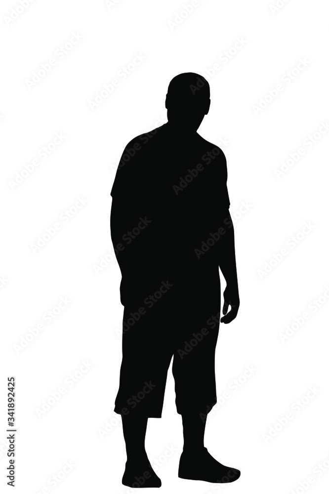 Silhouette of a young man stands