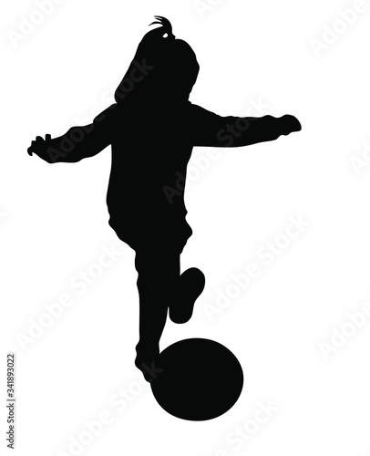 Silhouette of a little girl plays with ball