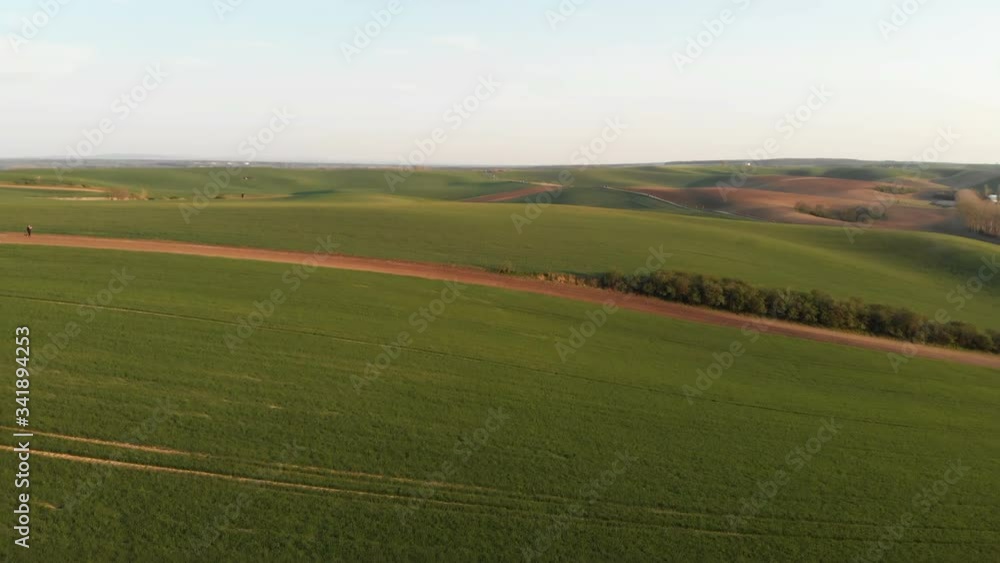 Fantastic view of the beautiful green hilly fields of Moravia, Czech Republic. Top view from drone. Fantastic view of the beautiful green hilly fields of Moravia, Czech Republic. Top view from drone.