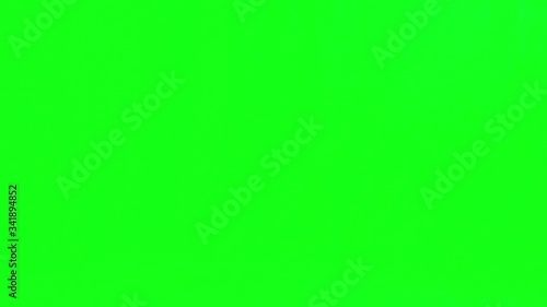 Cute little kids asian playing, dancing, jumping and walking.Happy 3-4 years old girl and boy.Make faces and smile over green screen.