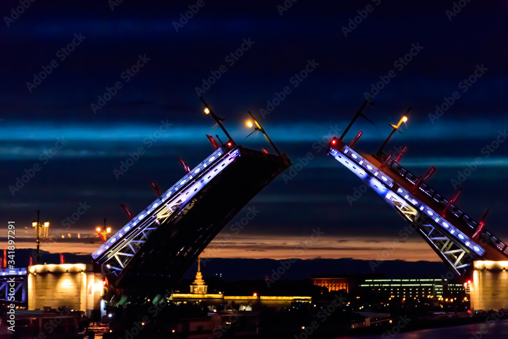 Opening of Palace drawbridge. Night view of Palace bridge from the Neva river in Saint Petersburg, Russia Opening of Palace drawbridge. Night view of Palace bridge from the Neva river in Saint Petersburg, Russia