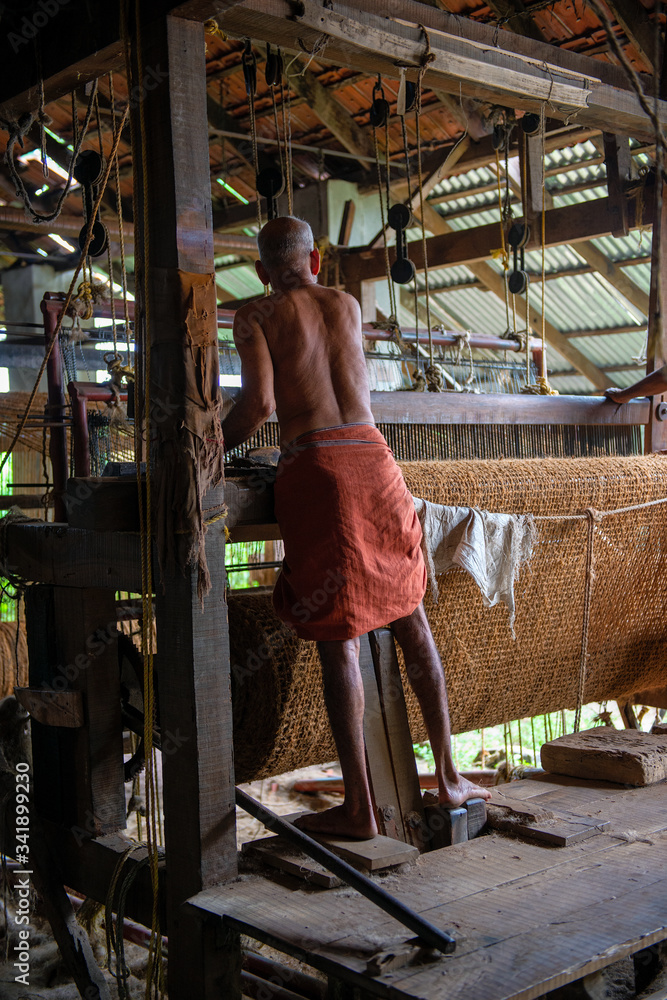 Man working in traditonal coir factory
