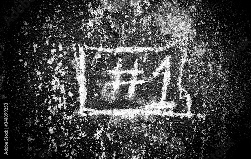 Number one sign on a concrete in black and white shows  the end of the world