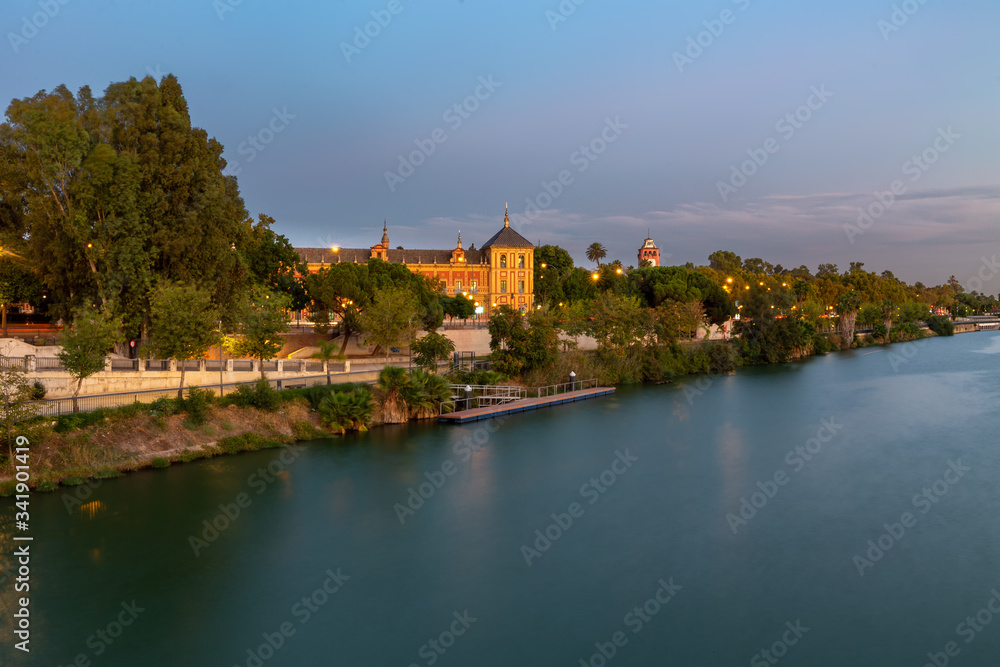 Sunset over the Guadalquivir river in Seville, Andalucia, Spain.