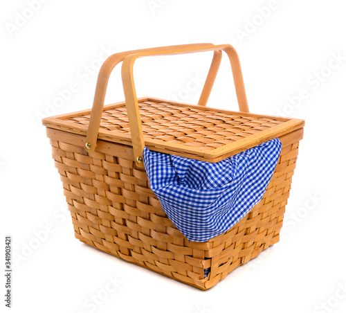 Picnic basket with blue gingham, checked cloth