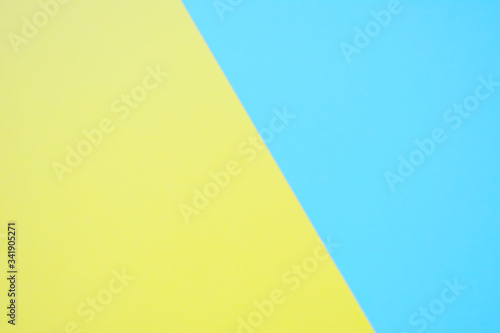 Free Download Beautiful pastel trendy yellow with blue  background. Light texture, blank - GFXLoad