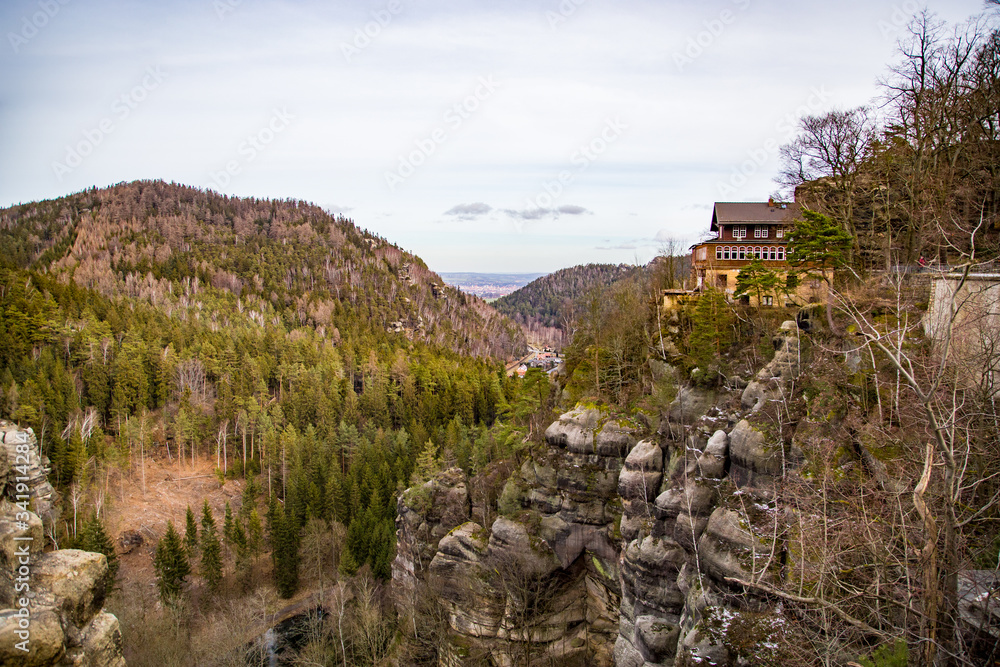the view from the castle Oybin in the Zittau mountains into the valley and to the city Zittau. the view from the castle Oybin in the Zittau mountains into the valley and to the city Zittau.