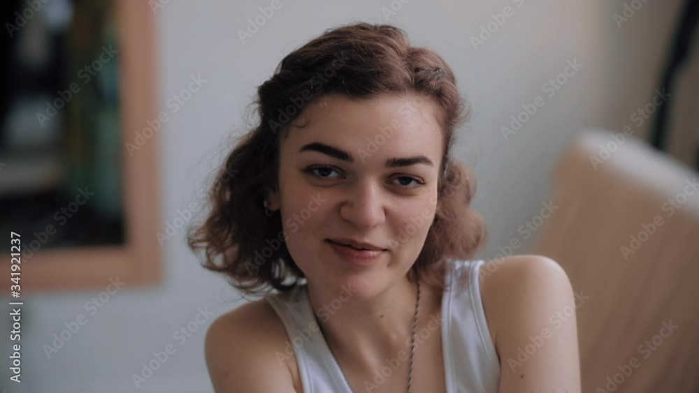 Beautiful woman portrait at home gazing at camera Beautiful woman portrait at home gazing at camera