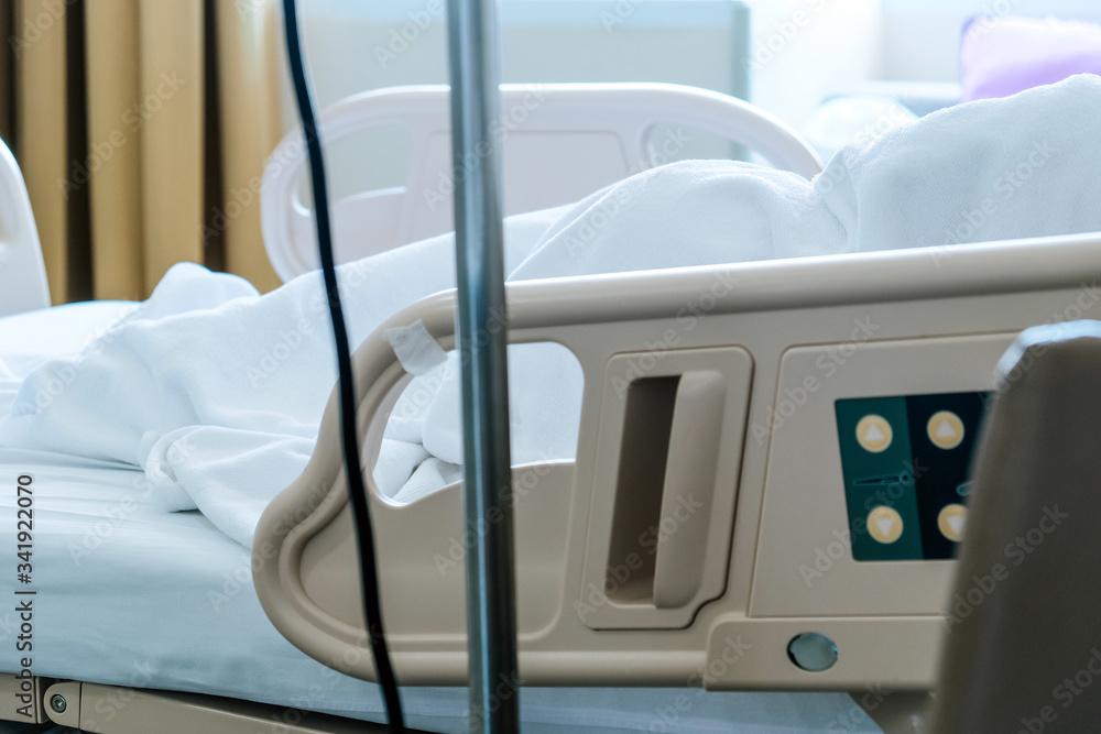 Close up of Patient bed with Elderly patients in hospital Close up of Patient bed with Elderly patients in hospital