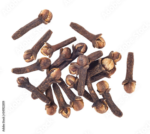 Heap of cloves on white background. Flat lay.