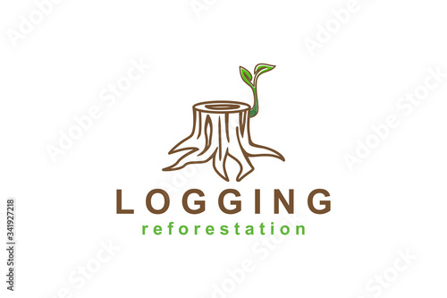 Forest logging tree stump logo with young shoots growing photo