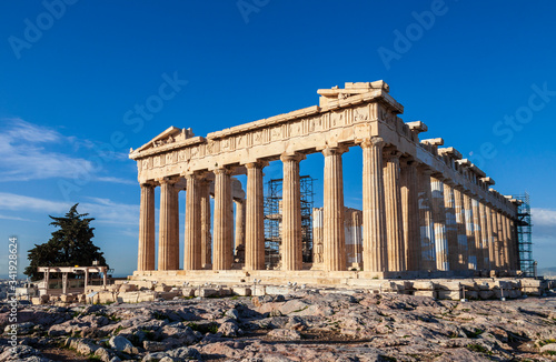 Parthenon Temple in the morning sun. Acropolis in Athens, Greece. Parthenon without tourists during the coronavirus pandemic.