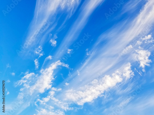 Cirrus clouds on blue sky