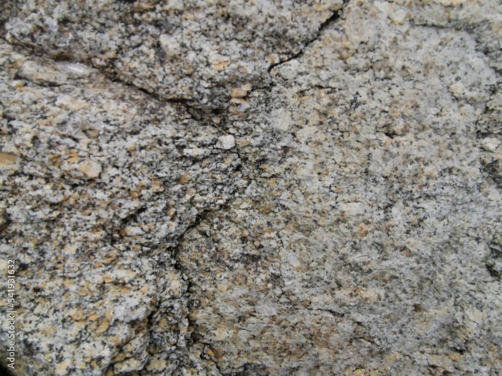 Naklejka premium stone gray background, texture of stone wall with cracks