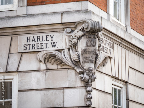 Photography Harley Street, City Of Westminster street sign- a landmark London street notable
