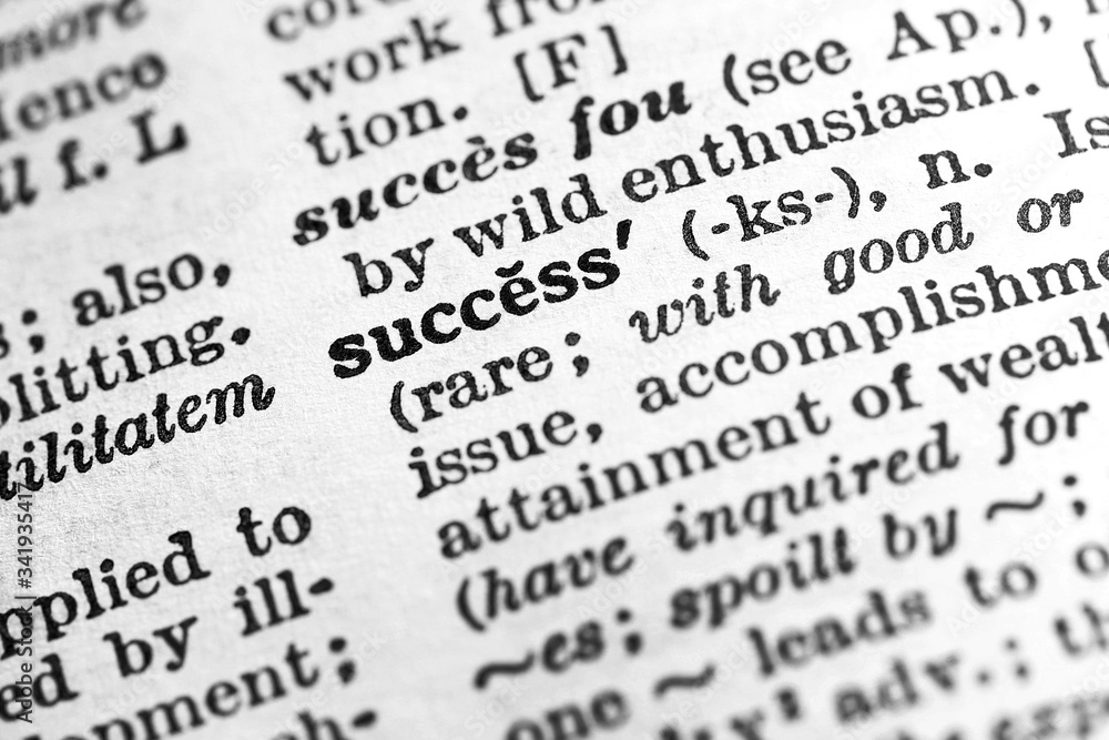Success - Closeup macro of English dictionary page with word success Success - Closeup macro of English dictionary page with word success