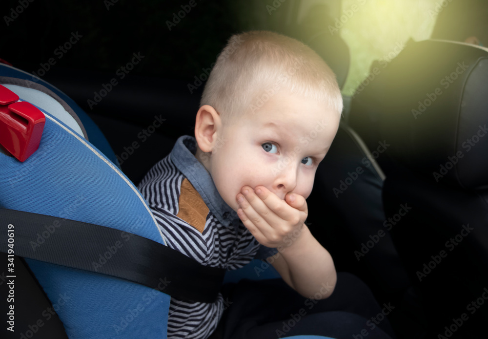 The child was rocked in a car seat. The boy suffers from and
