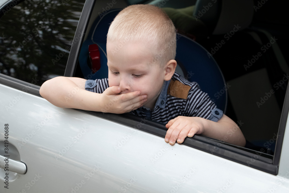 The child was rocked in a car seat. The boy suffers from and motion sickness. The